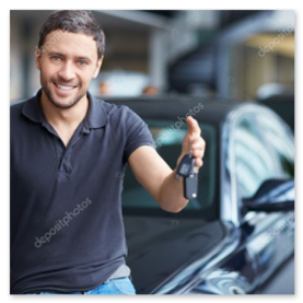 New driver smiling and holding car keys after passing